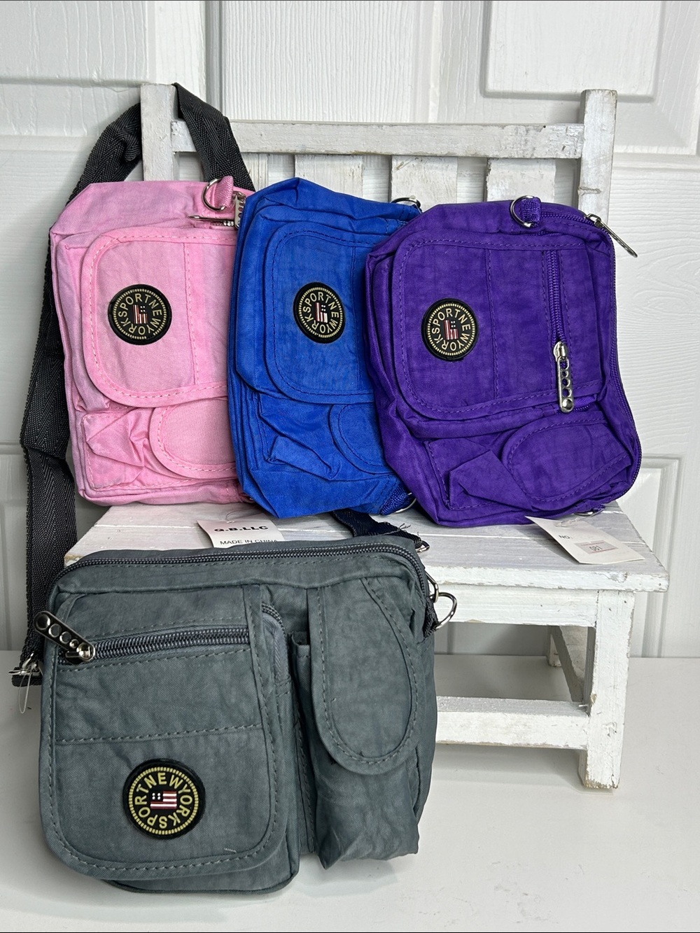 Sport New York Compact Crossbody Bag - Available in Pink, Blue, Purple, Gray